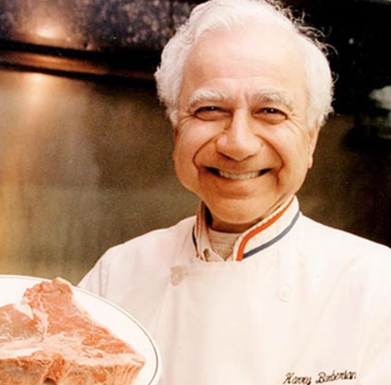 Photo of Harry Barberian holding a steak