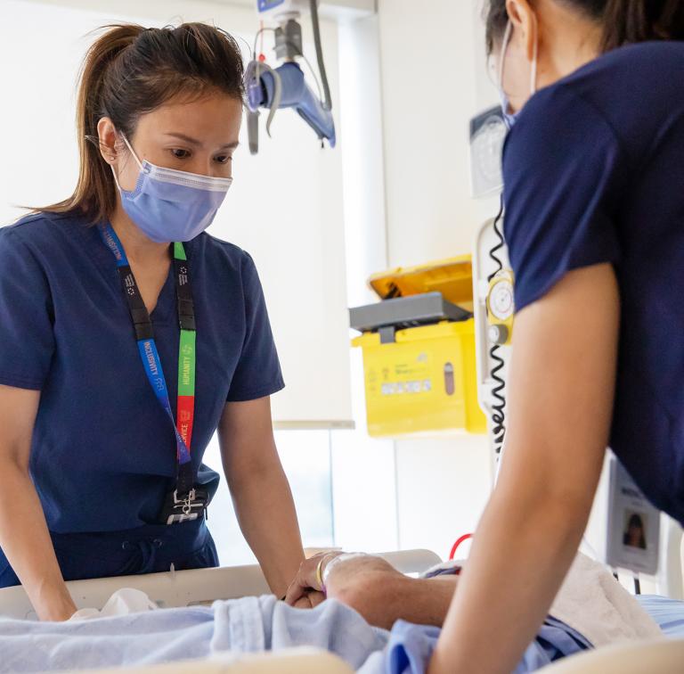 Nurses with a patient at Sinai Health