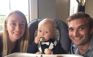 Steve Thompson with partner and baby.