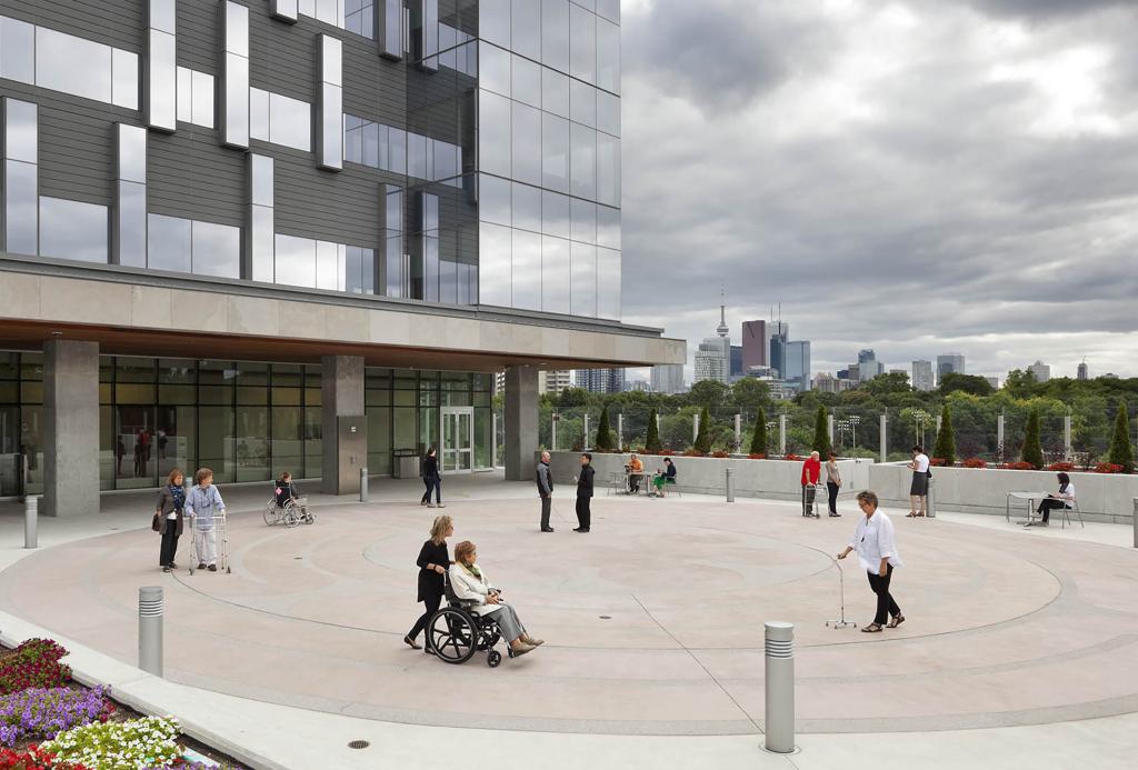 People walk the labyrinth outside Hennick Bridgepoint hospital 