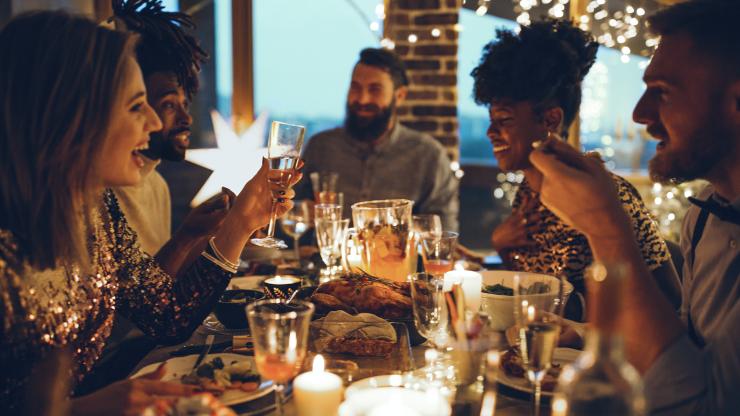 Group of people at a festive dinner party