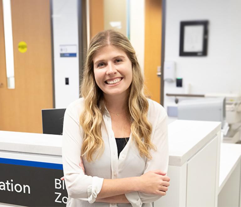 Nurse standing in front of communication station in the ED.