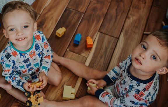 Toddler twins playing with toys