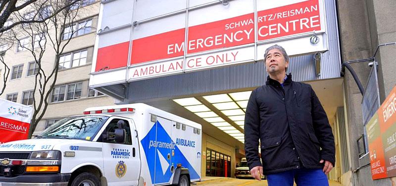 Dr. Jacques Lee in front of Mount Sinai Emergency Department