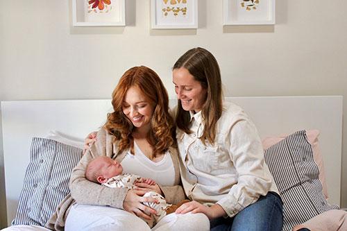 Michaela and Nicole Torrie with their baby, Iggy