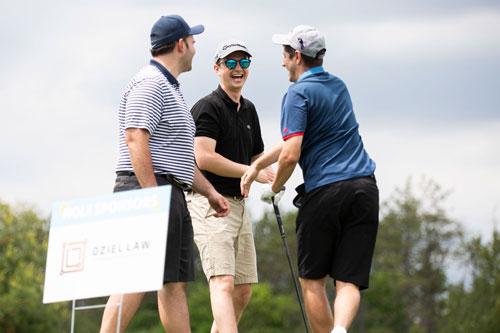 Golfers at the Swing for Sinai gold tournament