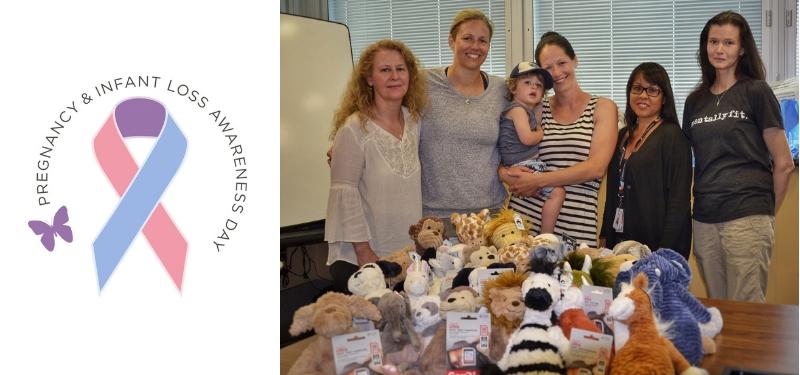 Group standing behind a pile of stuffed toys, a ribbon graphic on the left