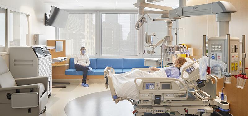 patient in bed in new modern ICU room