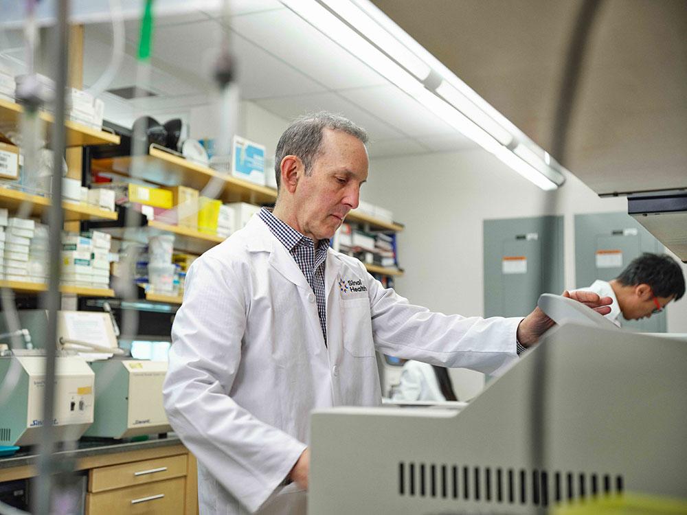 man stands in medical laboratory