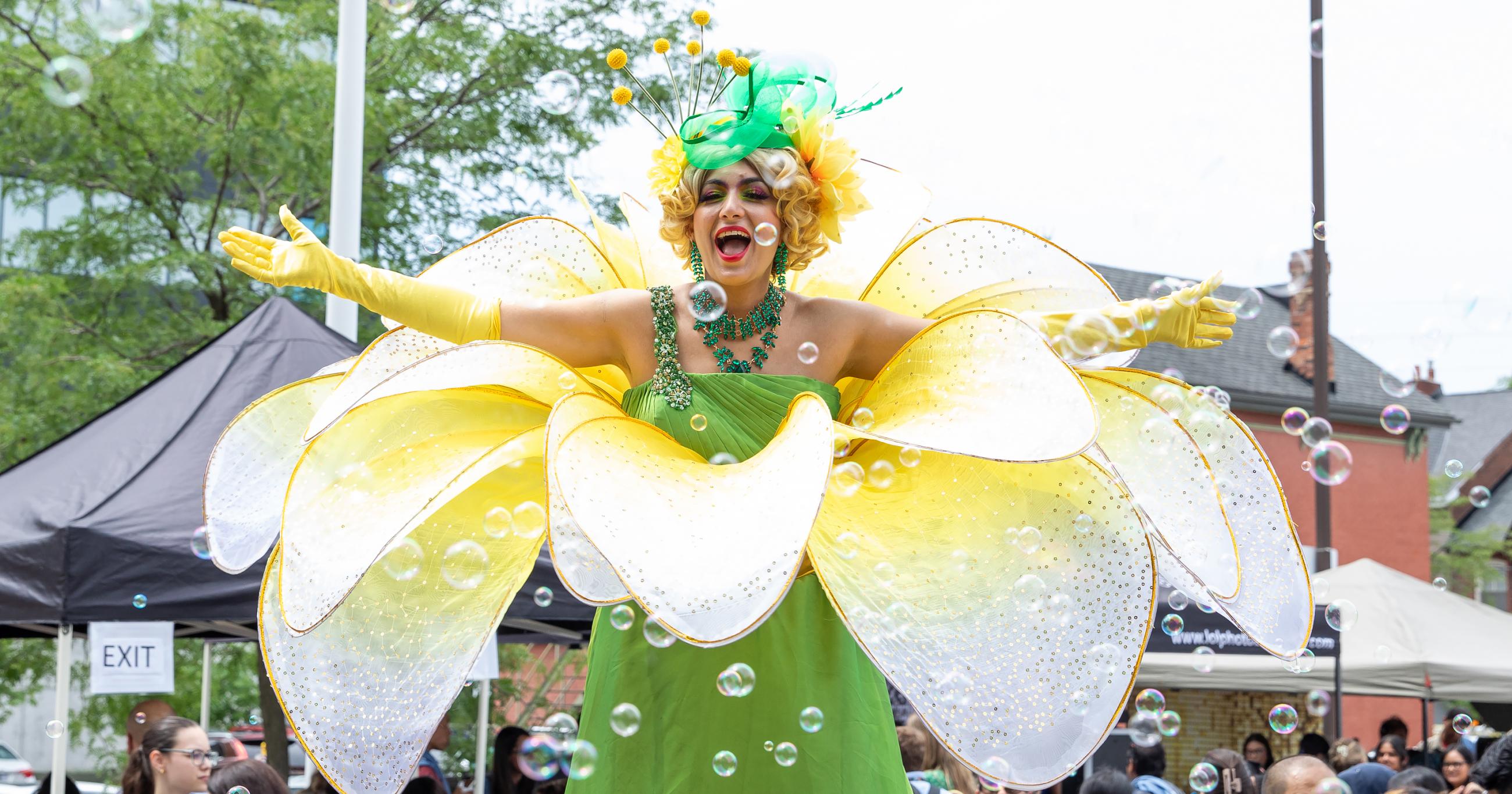 Performer on stilts posing 