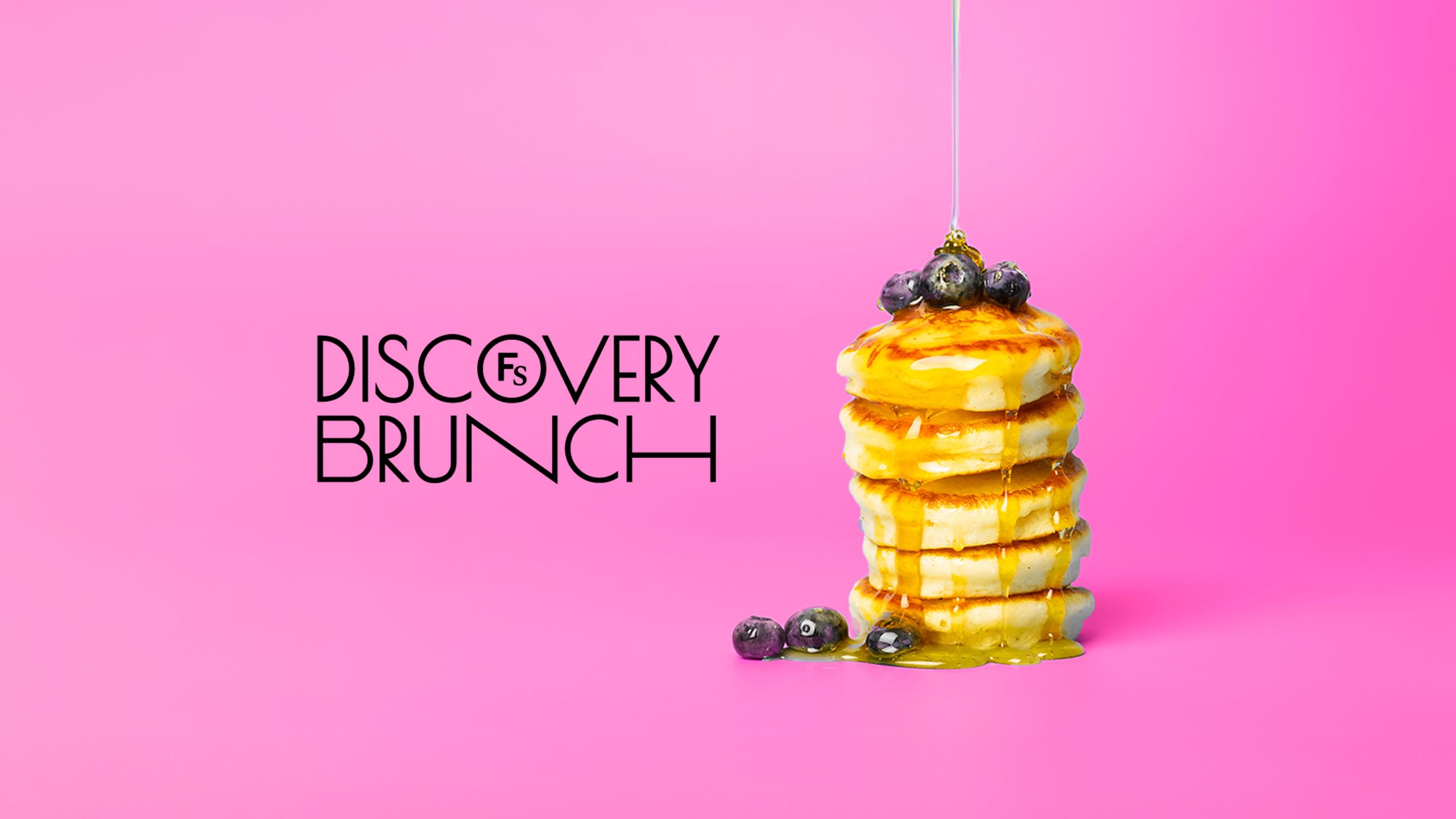 Logo that says discovery brunch next to a stack of pancakes on a bright pink background