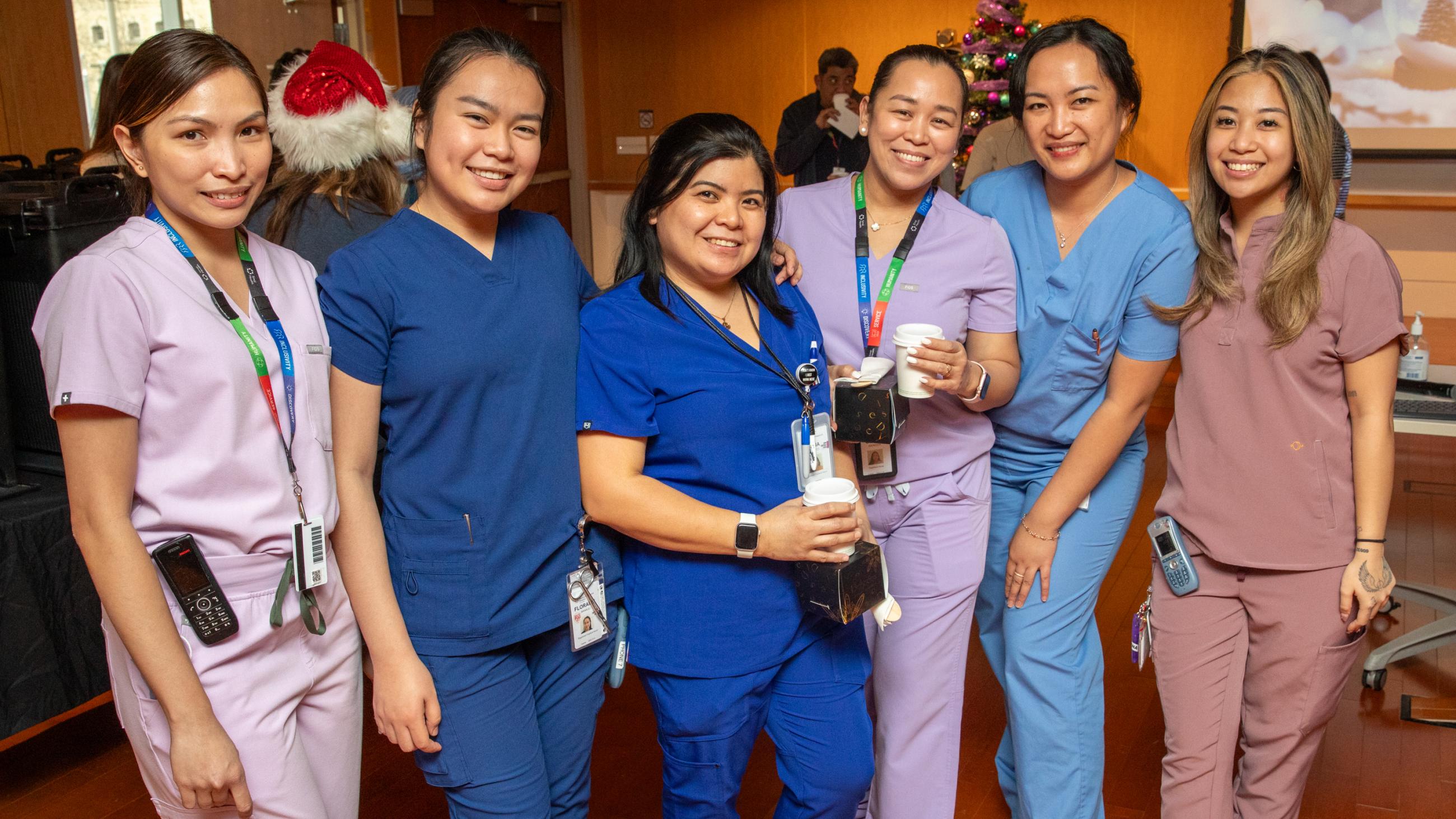 Sinai Health people celebrate together at the annual Holiday Open House.