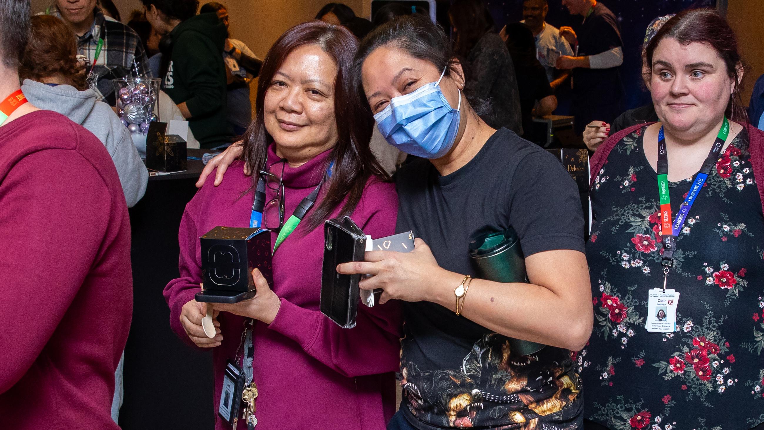 Sinai Health people celebrate together at the annual Holiday Open House.