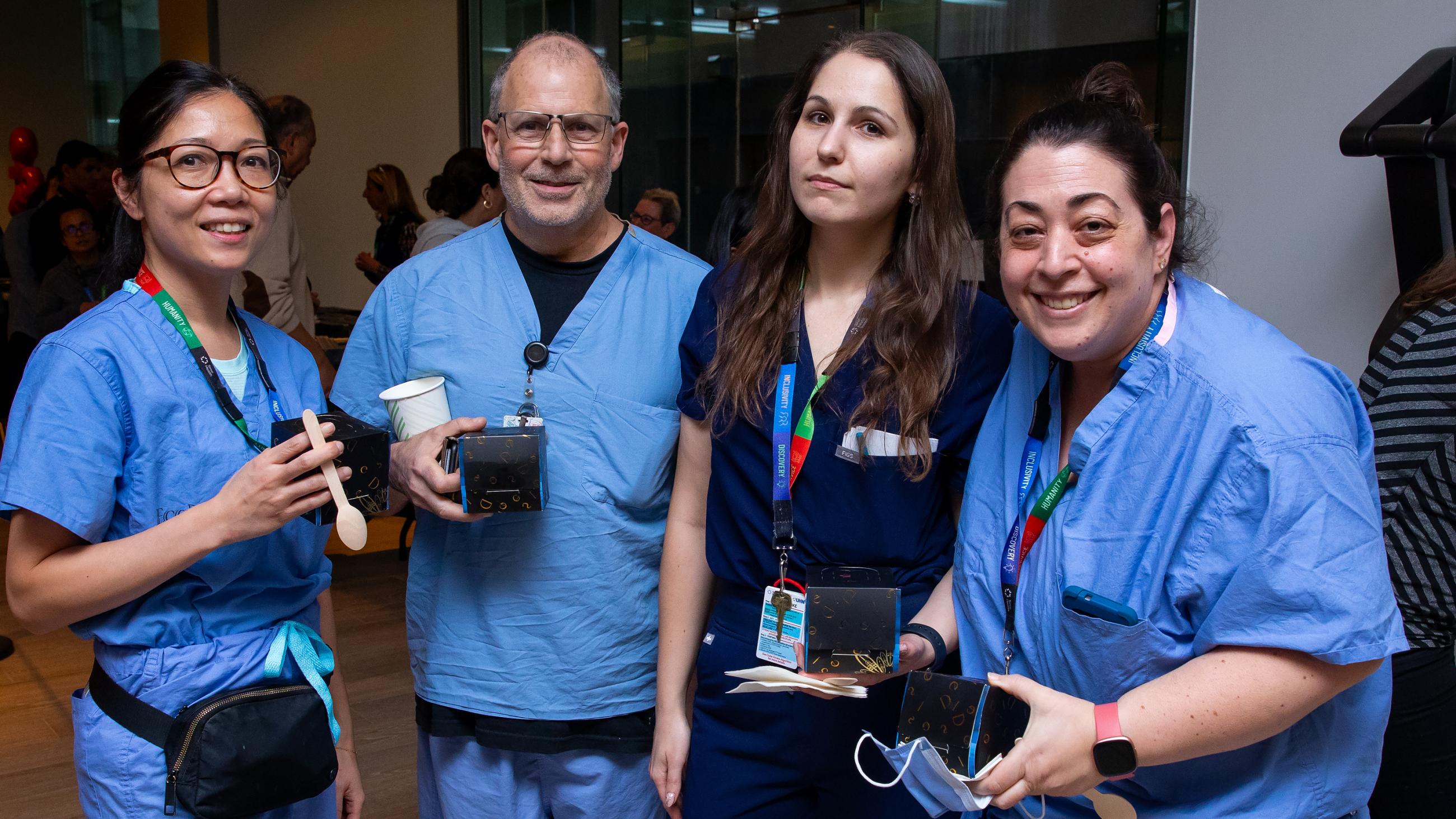 Sinai Health people celebrate together at the annual Holiday Open House.