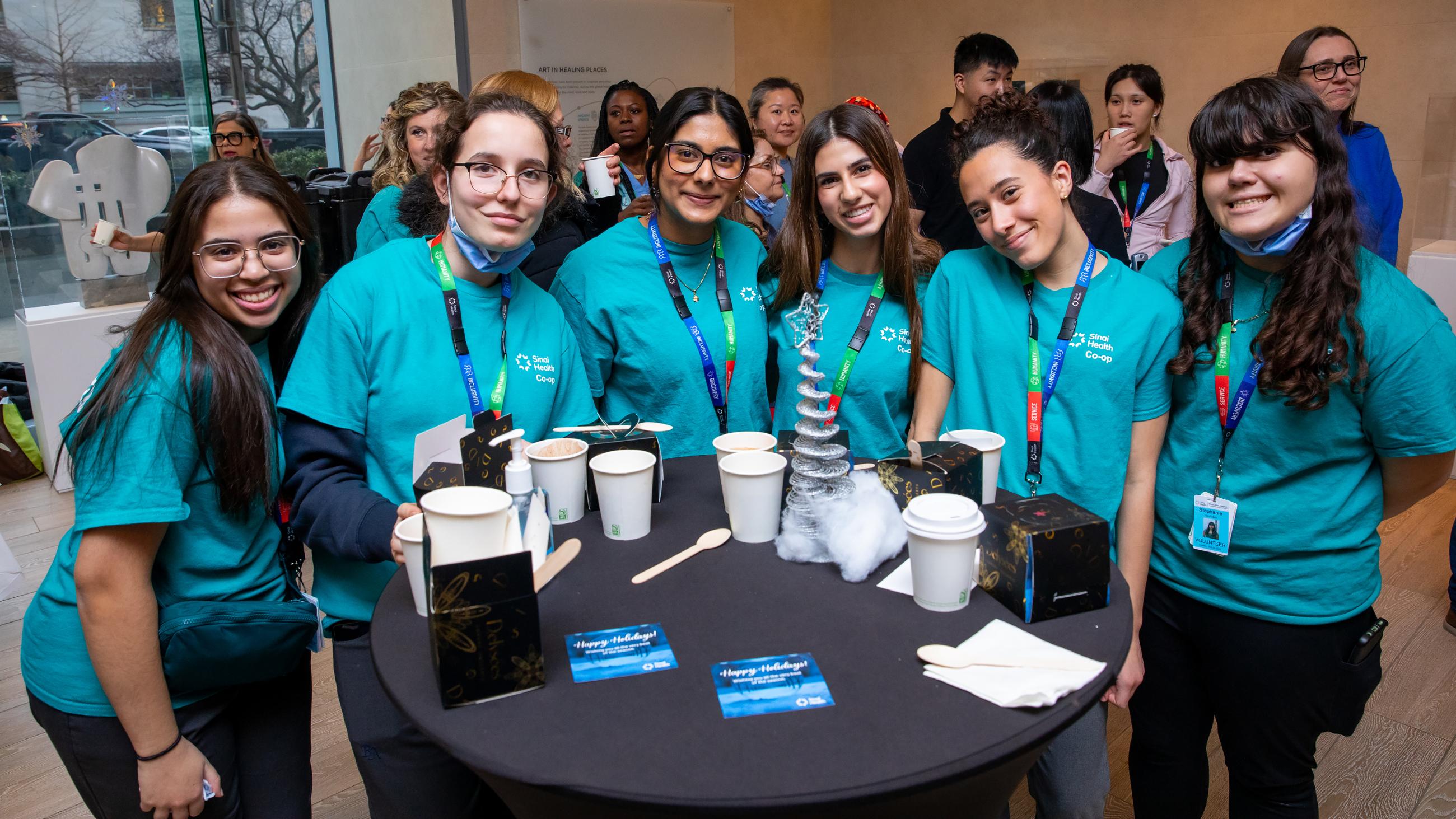 Sinai Health people celebrate together at the annual Holiday Open House.