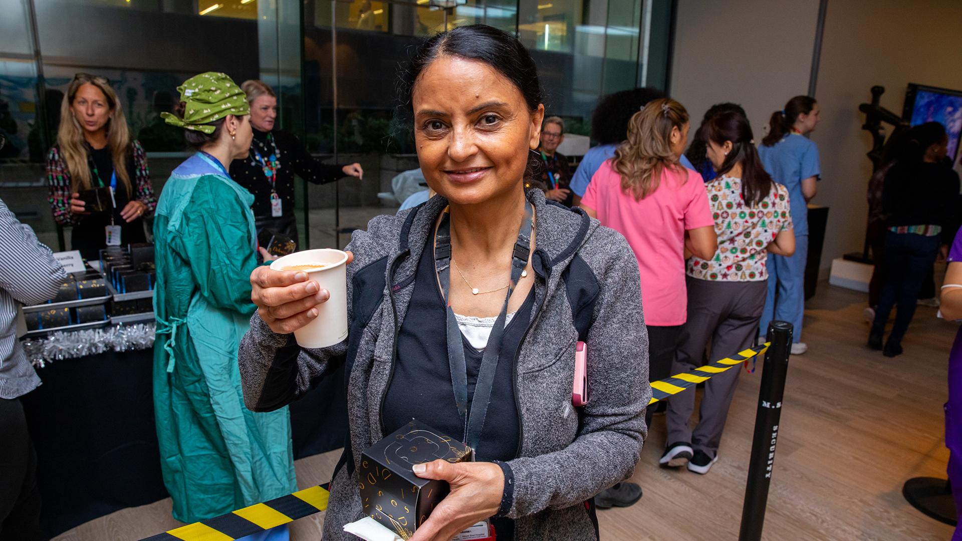 Sinai Health people celebrate together at the annual Holiday Open House.