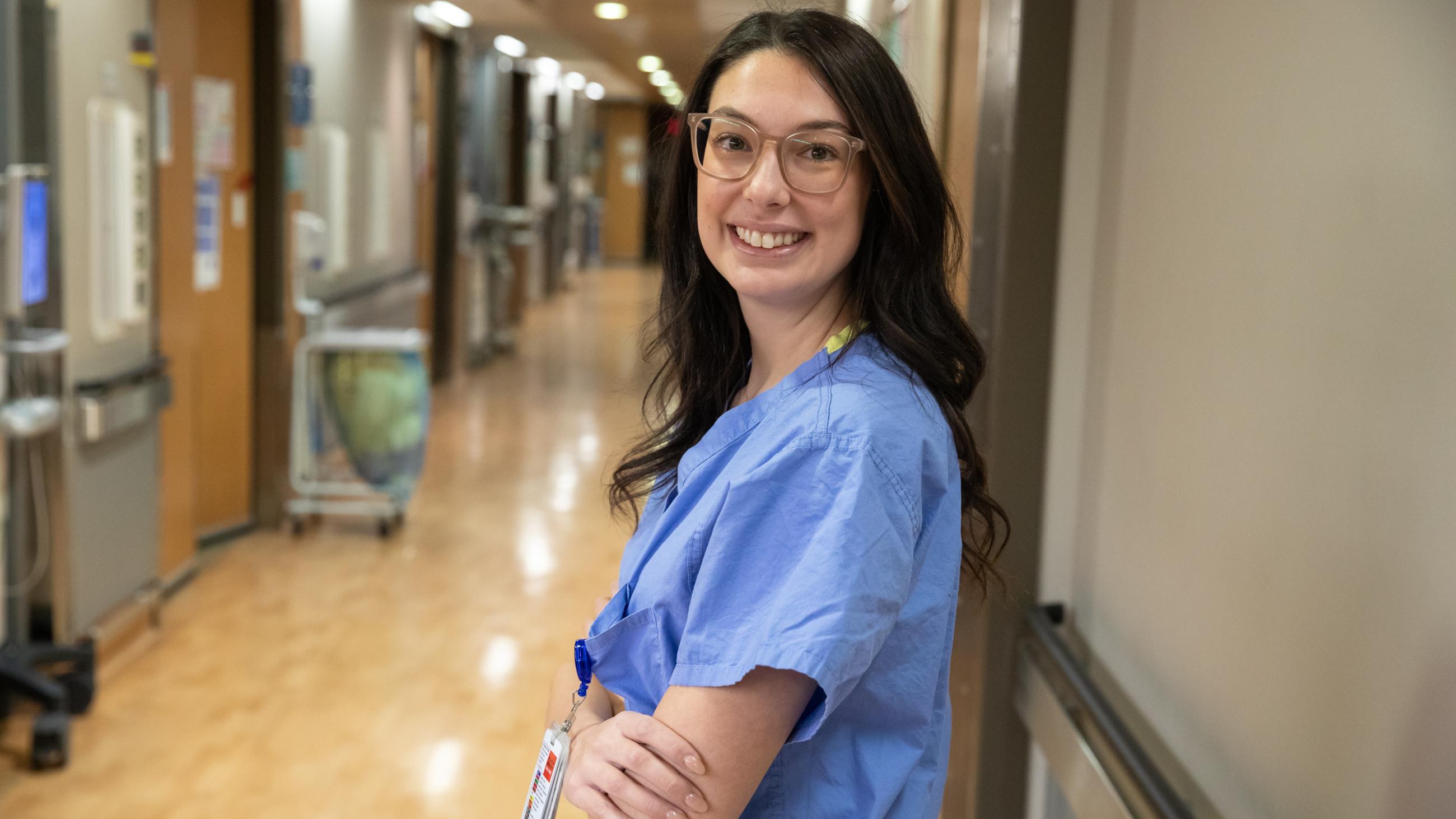 A Registered Nurse poses for her headshot in the Labour and Delivery floor of Mount Sinai Hospital.