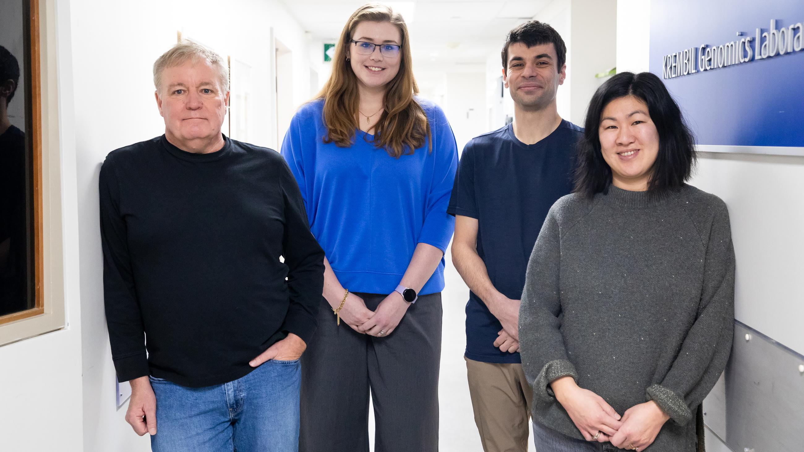 A group of four people pictured in the research institute.