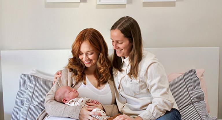 Michaela and Nicole Torrie with their baby, Iggy