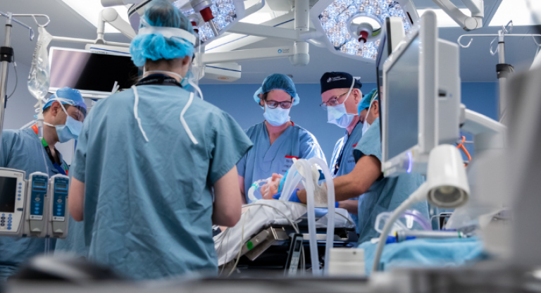 A surgical team performs a procedure in the new operating space at Mount Sinai Hospital.