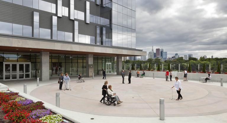 People walk the labyrinth outside Hennick Bridgepoint hospital 