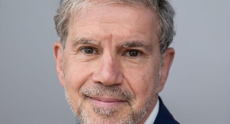 Man wearing dark blue suit