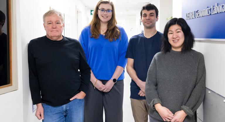 A group of four people pictured in the research institute.