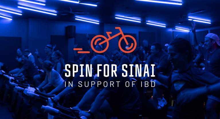 spin for sinai logo in foreground with people on spin bikes in the background