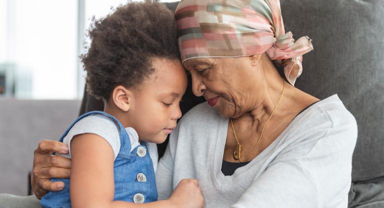 Grandmother holding grandchild