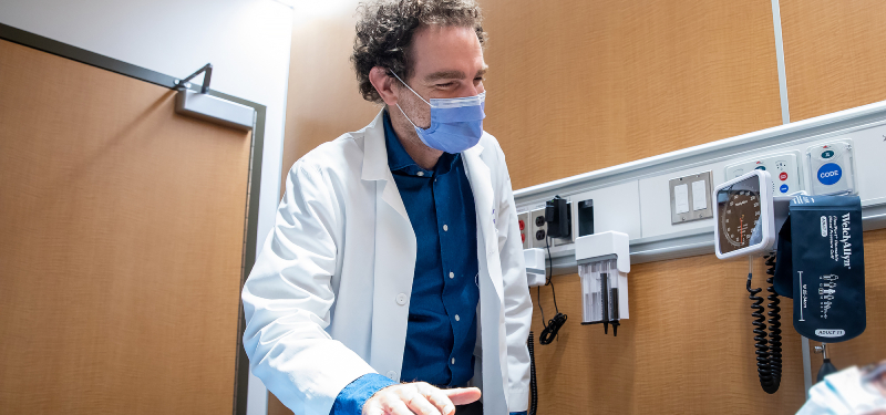 Dr. Adam Weizman with a patient